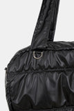 Padded glossy leather shoulder bag
