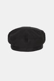 Shelby string newsboy cap