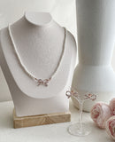 Louei Cubic Ribbon Earrings
