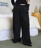 Off-pleated slacks pants