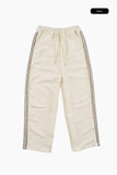 Drain tweed track pants