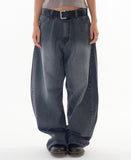 Black washed curved denim pants
