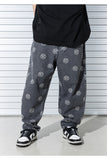 SMILE PATTERN DENIM PANTS
