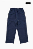Drain tweed track pants