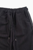 Drain tweed track pants
