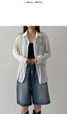 Holding see-through loose fit shirt