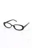 Round bold horn-rimmed glasses