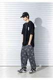 SMILE PATTERN DENIM PANTS