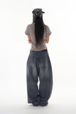 Black washed curved denim pants