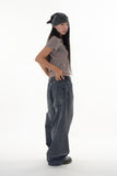 Black washed curved denim pants