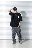 SMILE PATTERN DENIM PANTS