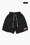 Pain patch bermuda pants