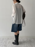 Holding see-through loose fit shirt