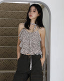 Leopard ruffle sleeveless blouse