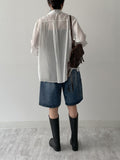 Holding see-through loose fit shirt