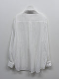 Holding see-through loose fit shirt