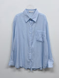 Holding see-through loose fit shirt
