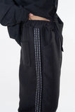 Drain tweed track pants