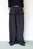 Off-pleated slacks pants