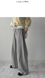 Two-way pleated training pants