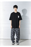 SMILE PATTERN DENIM PANTS