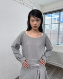 LAYERED BUTTON WRAP SHORT SKIRT
