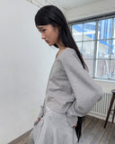 LAYERED BUTTON WRAP SHORT SKIRT