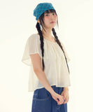 Less shirring blouse