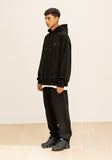 GRATING EMBLEM BACK SLIT ZIP PANTS
