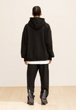 GRATING EMBLEM BACK SLIT ZIP PANTS