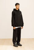 GRATING EMBLEM BACK SLIT ZIP PANTS
